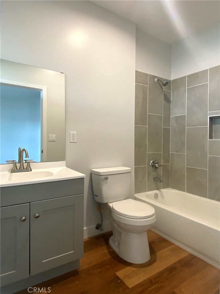 300 East Alhambra Road, Unit E Alhambra, CA 91801 - Photo 15 of 24 a bathroom with a sink toilet and shower