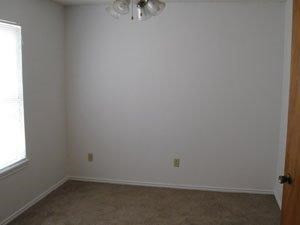 6111 38th Street, Unit A Lubbock, TX 79407 - Photo 8 of 9 a room that has a window