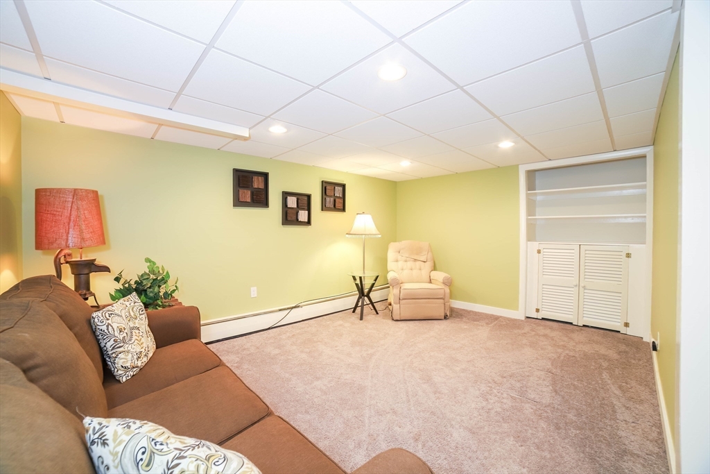 6 Reservoir Street Cherry Valley, MA 01611 - Photo 21 of 35 a living room with furniture and a window