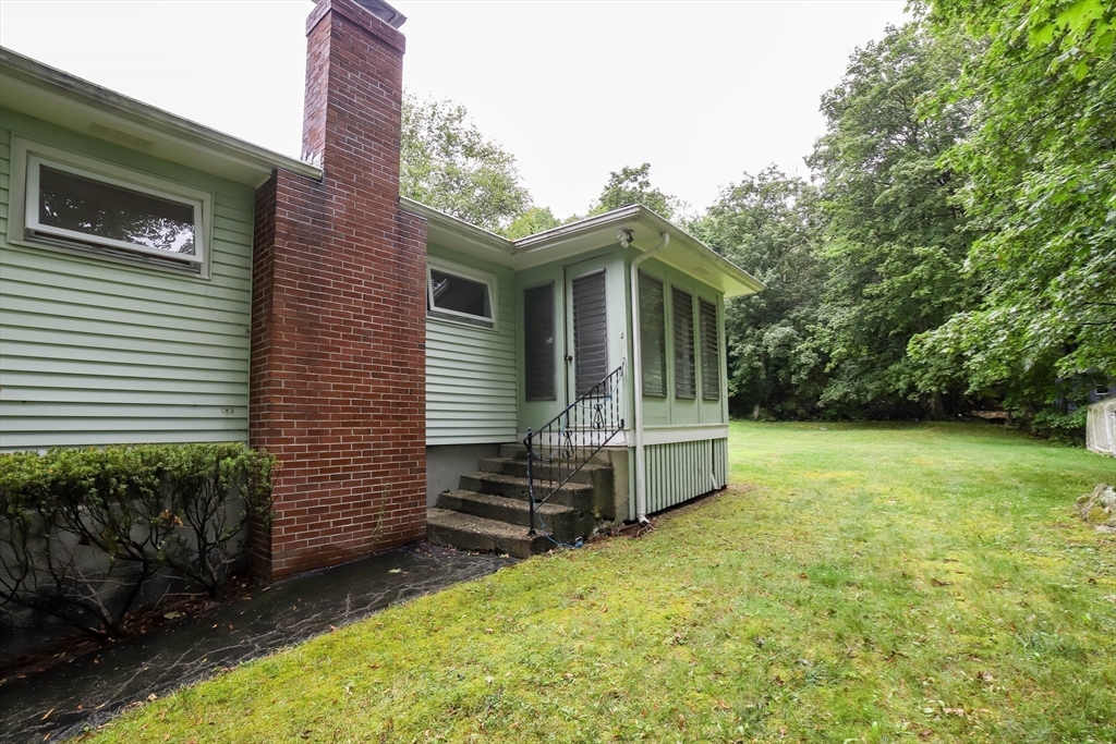 6 Reservoir Street Cherry Valley, MA 01611 - Photo 29 of 35 a front view of a house with a yard