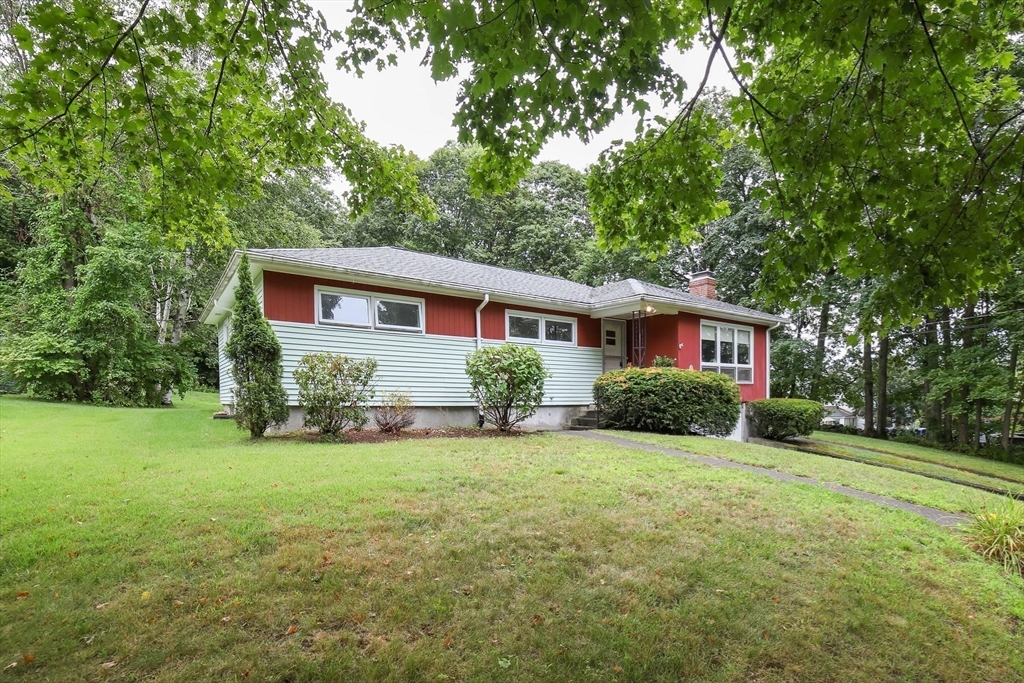 6 Reservoir Street Cherry Valley, MA 01611 - Photo 35 of 35 a front view of a house with a yard and trees