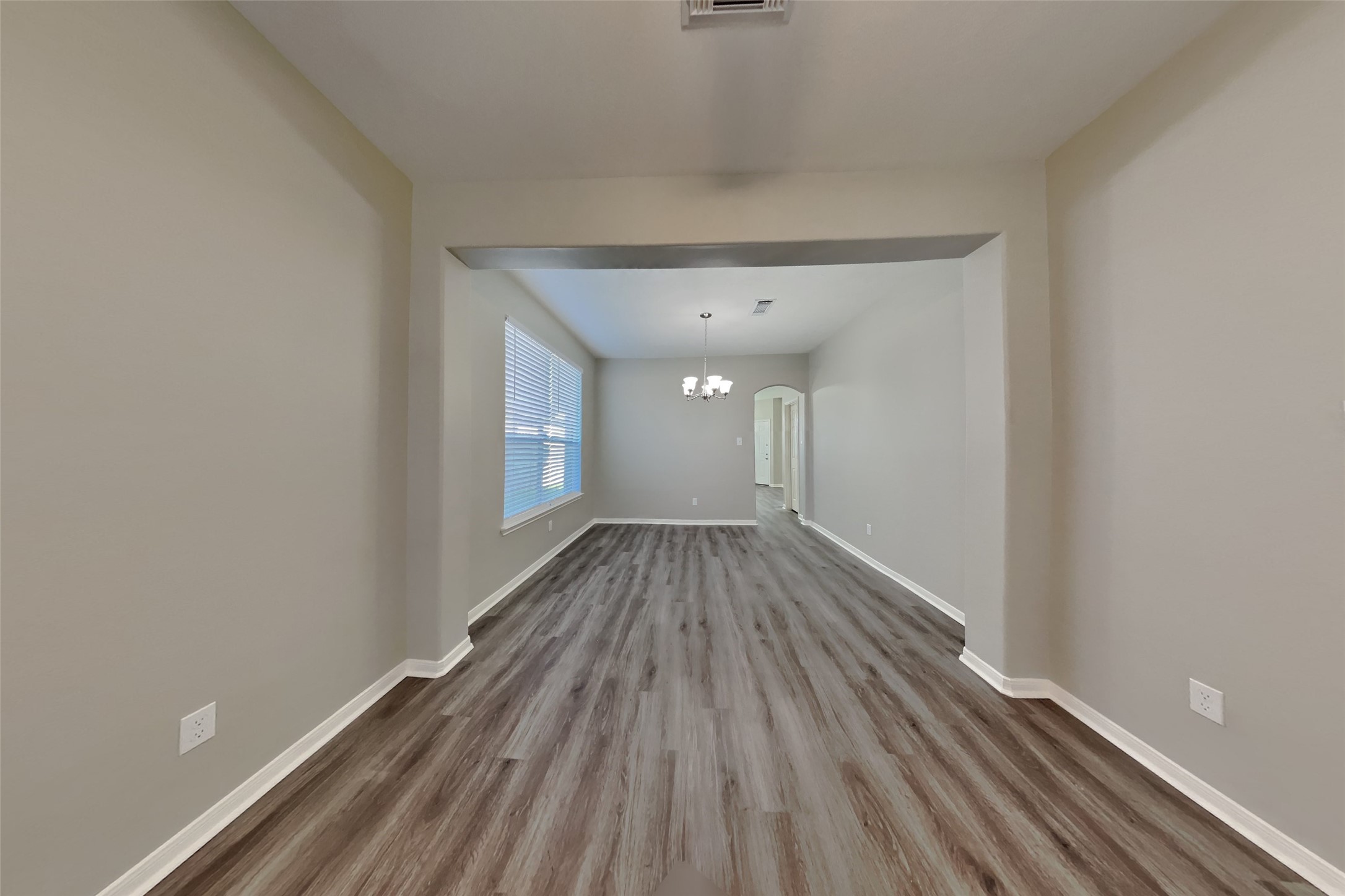 21122 Covington Bridge Lane Spring, TX 77388 - Photo 3 of 26 a view of a room with wooden floor