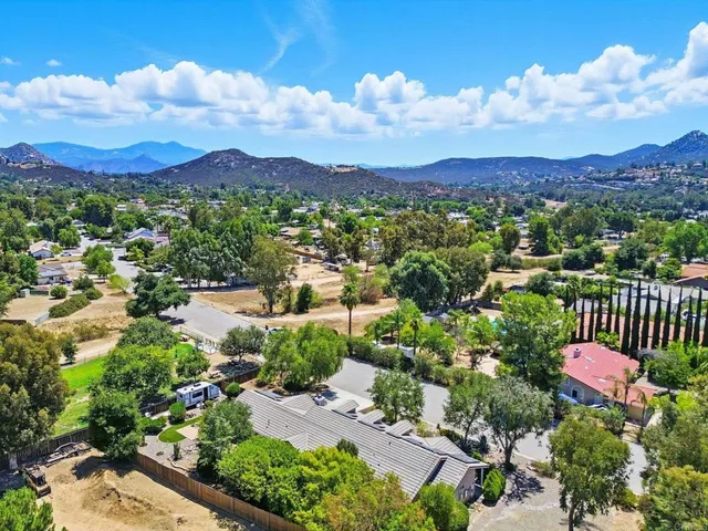 a view of a lot of trees and houses