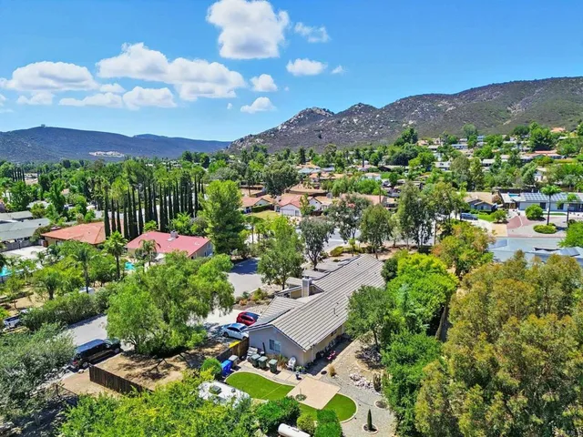 a view of a lot of trees and houses