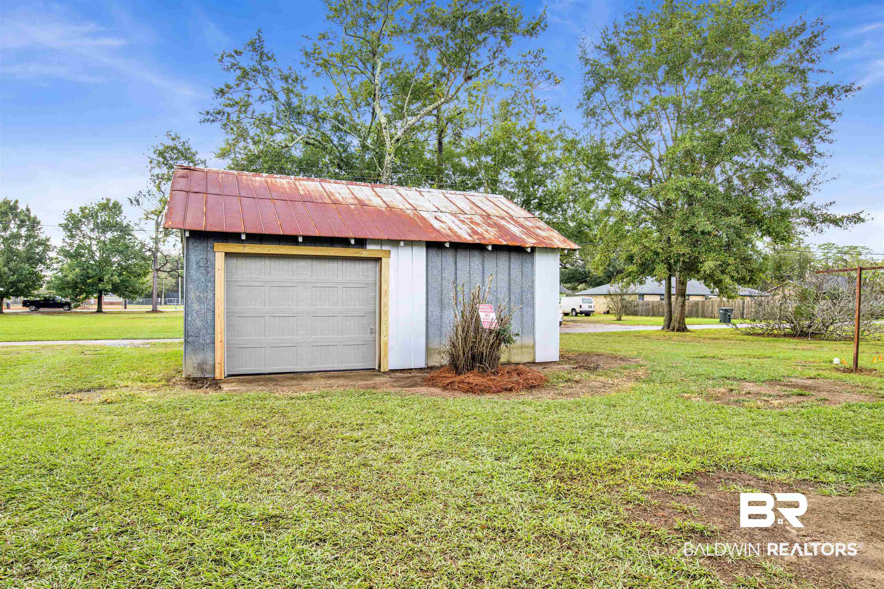 311 West Myrtle Avenue Foley, AL 36535 - Photo 21 of 22 Garage with a yard
