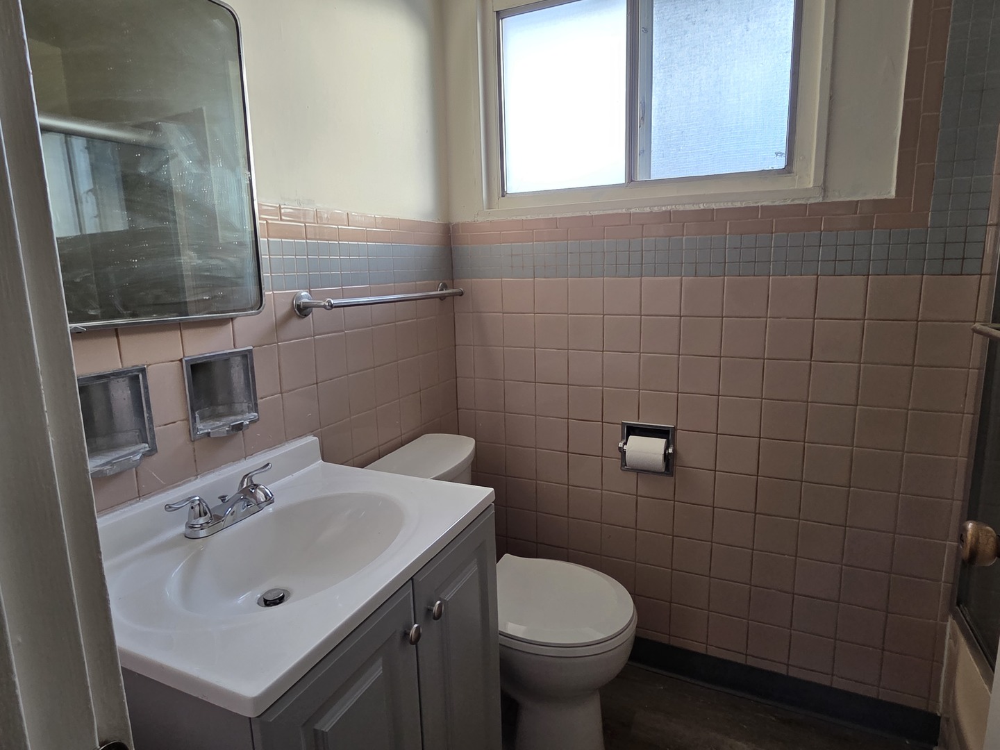 8649 Niles Center Road, Unit B Skokie, IL 60077 - Photo 14 of 22 a bathroom with a sink mirror and toilet
