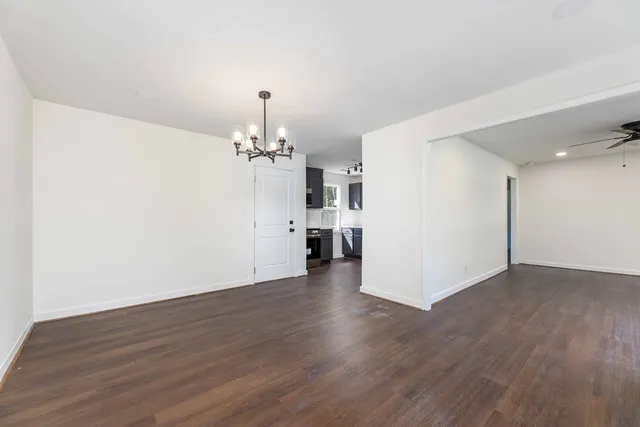 a view of a livingroom with wooden floor
