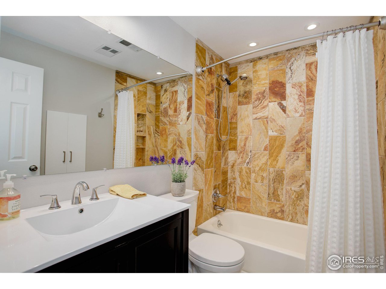 4717 Spine Road, Unit E Boulder, CO 80301 - Photo 14 of 29 Fully updated master bath with beautiful stone tiling,