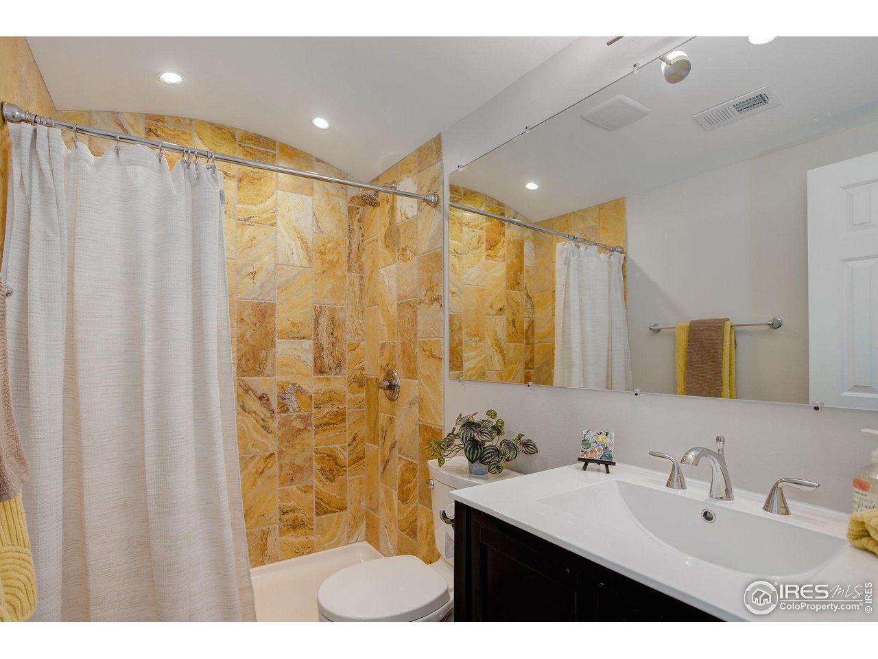 4717 Spine Road, Unit E Boulder, CO 80301 - Photo 17 of 29 2nd full bath, fully updated- custom stone tiling, stainless steel finishes