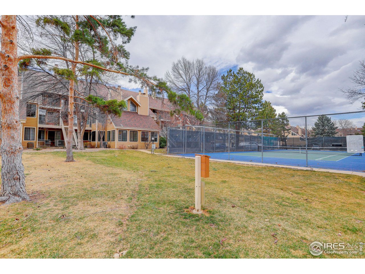 4717 Spine Road, Unit E Boulder, CO 80301 - Photo 29 of 29 beautifully landscaped and maintained community grounds with walking paths, tennis court, and pool