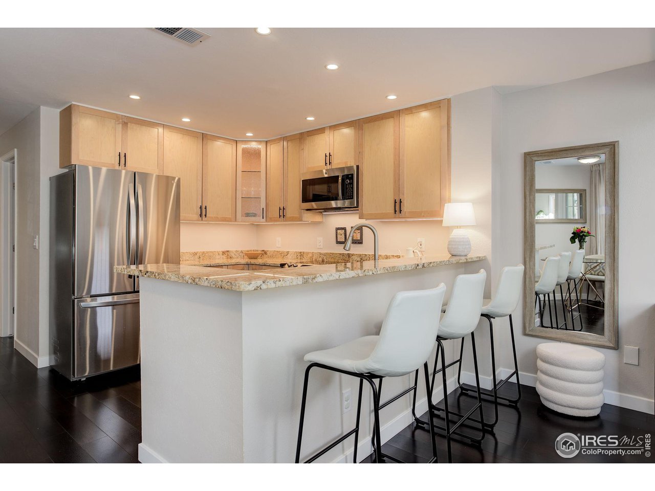 4717 Spine Road, Unit E Boulder, CO 80301 - Photo 9 of 29 enjoy breakfast up at the bar or entertain guests with this modern kitchen