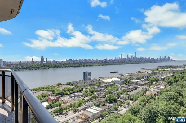 a view of a lake with a city view