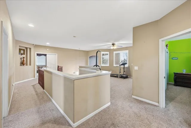 a view of living room with furniture and closet