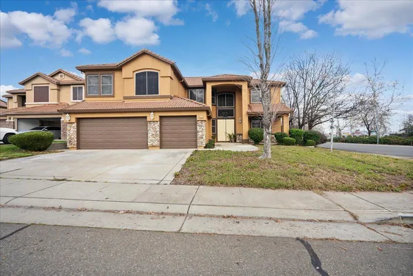 front view of house with a yard