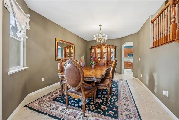 a view of a dining room with furniture