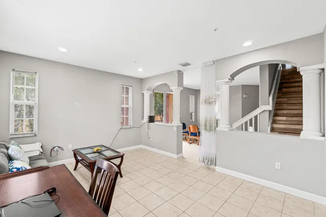 a view of room with window and ceiling fan