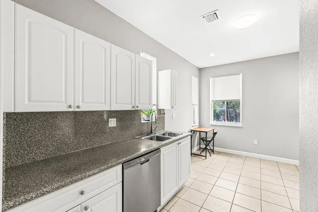 a room with furniture and a window