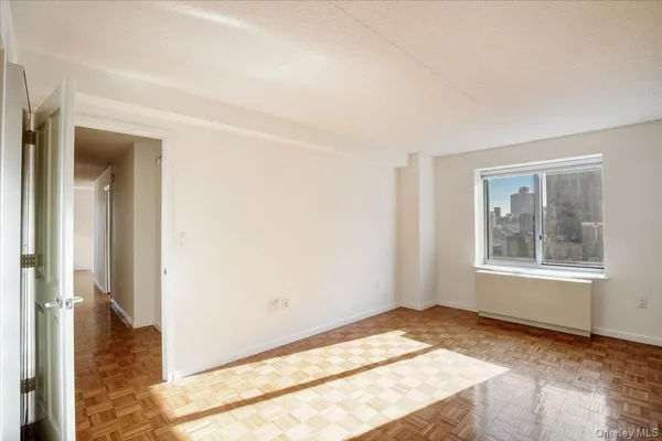 a view of an empty room and window