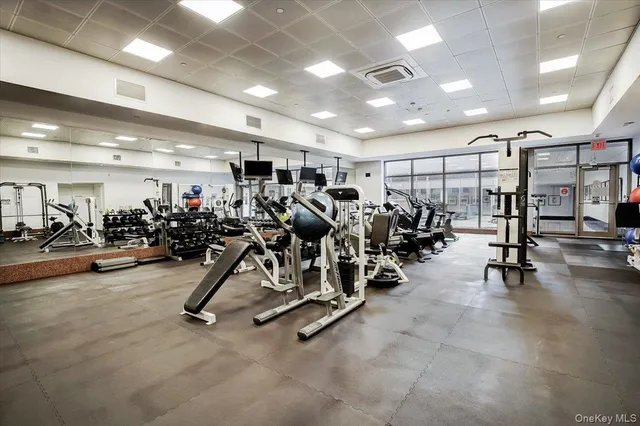 a view of a livingroom with furniture and a flat screen tv