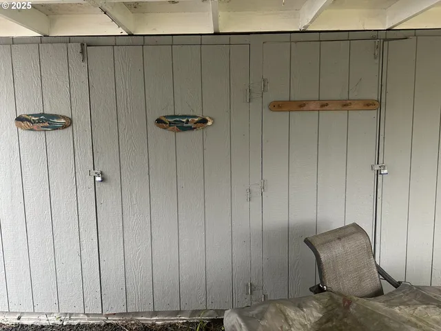 a kitchen with furniture and a window