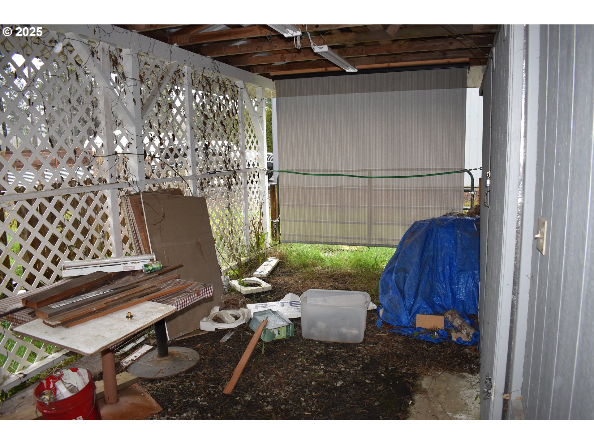 125 North 4th Street Lakeside, OR 97449 - Photo 32 of 39 a view of a chairs and table in a patio