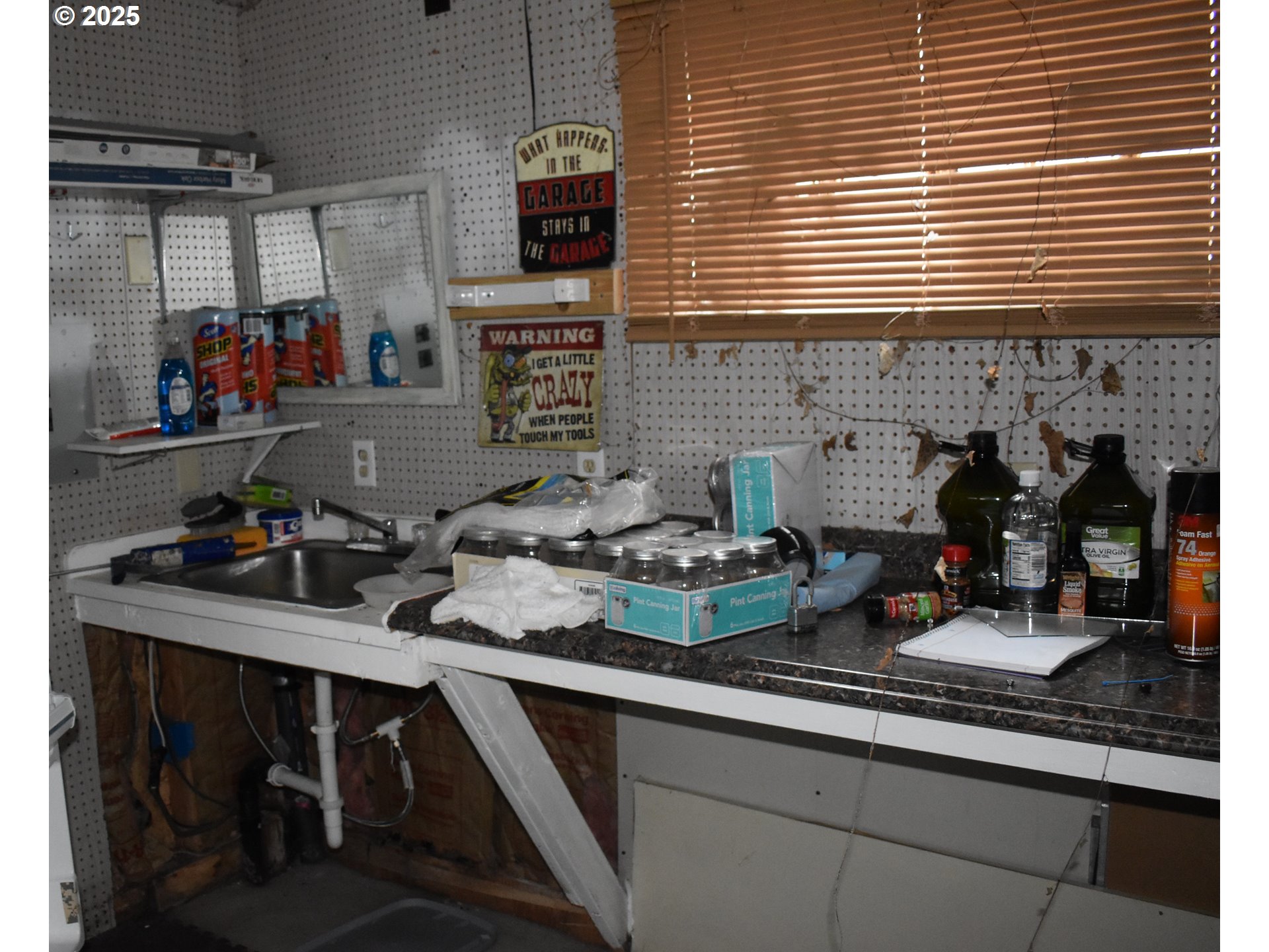 125 North 4th Street Lakeside, OR 97449 - Photo 33 of 39 a kitchen with furniture and a window