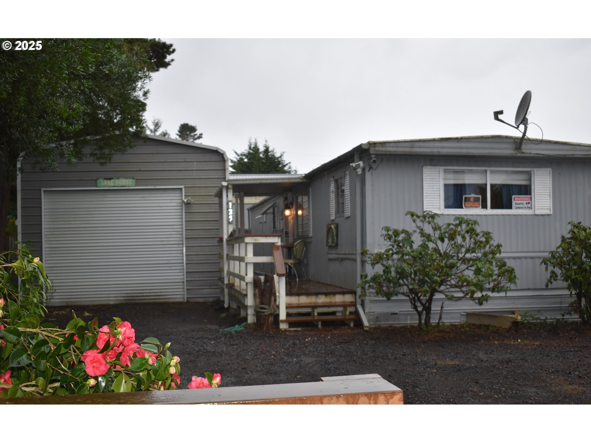 125 North 4th Street Lakeside, OR 97449 - Photo 39 of 39 a front view of house with yard