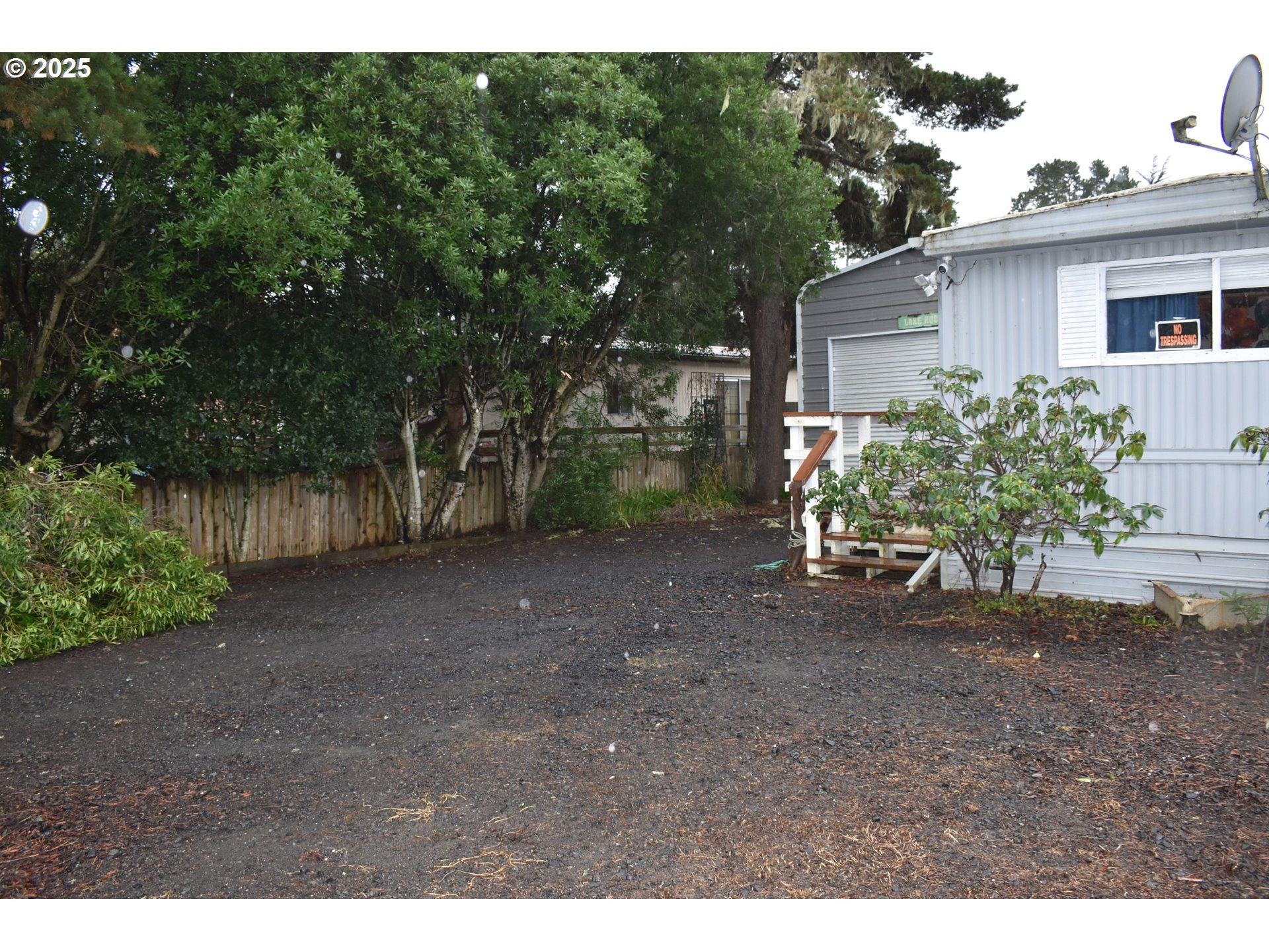 125 North 4th Street Lakeside, OR 97449 - Photo 6 of 39 a view of a house with a yard