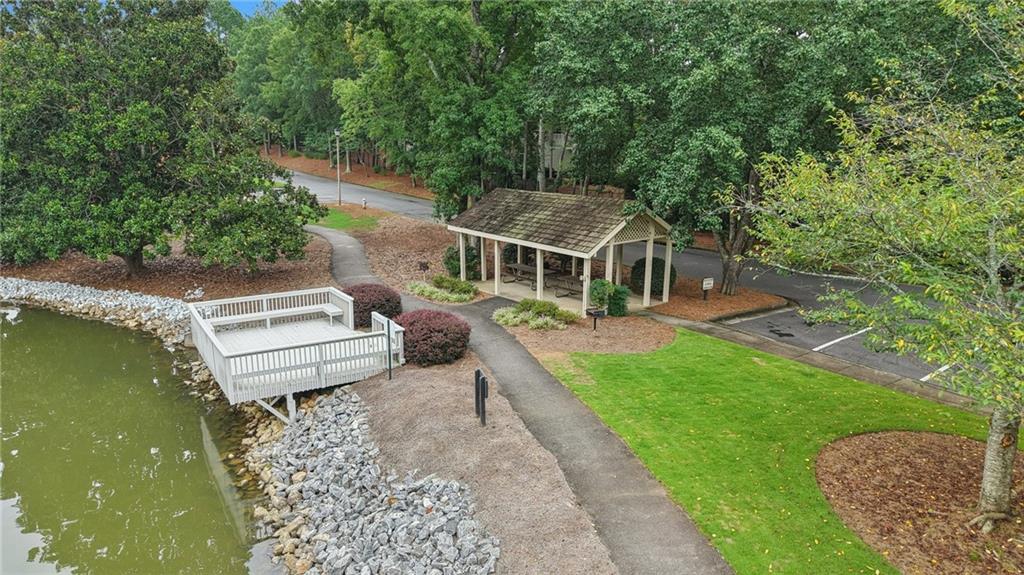 4166 Oakwood Way Duluth, GA 30096 - Photo 18 of 28 a view of a house with a yard