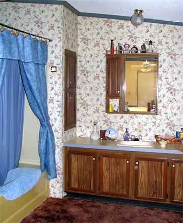 154 Great Road, Unit 4 Shirley, MA 01464 - Photo 13 of 16 a bathroom with a sink and a mirror