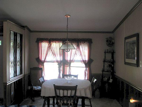 154 Great Road, Unit 4 Shirley, MA 01464 - Photo 5 of 16 a view of a dining room with furniture window and outside view