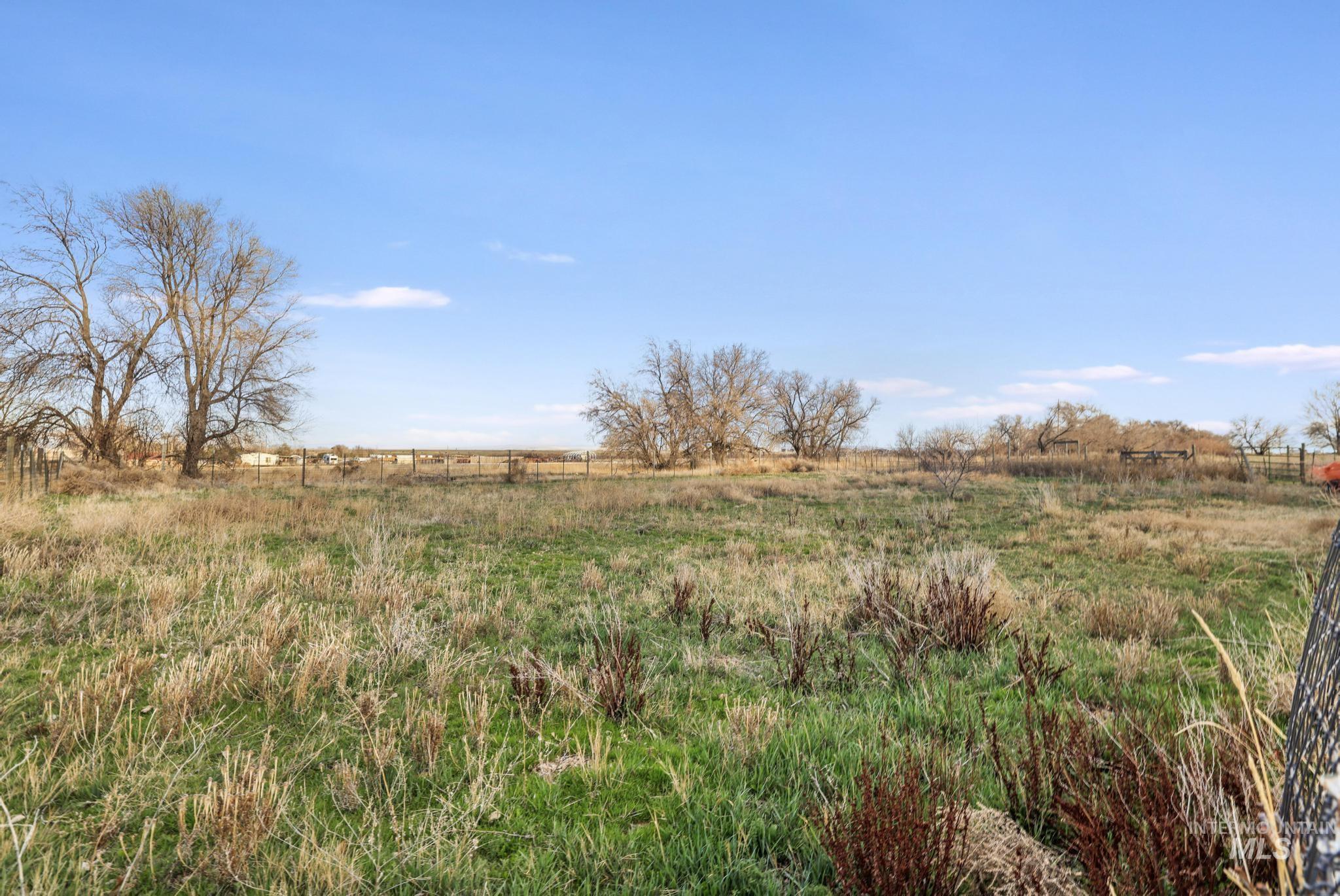 2735 East 3300 N Road Twin Falls, ID 83301 - Photo 11 of 24 View of yard with a view of countryside