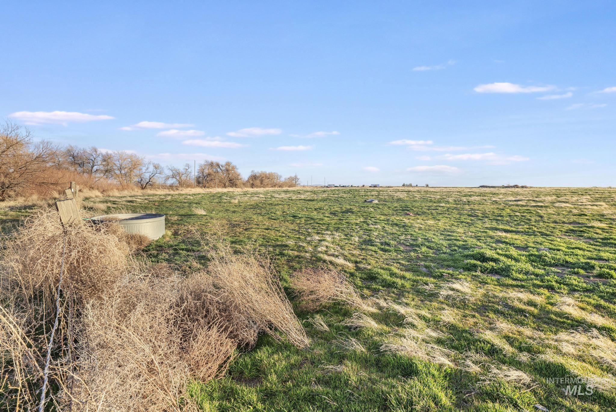 2735 East 3300 N Road Twin Falls, ID 83301 - Photo 21 of 24 View of yard featuring a rural view