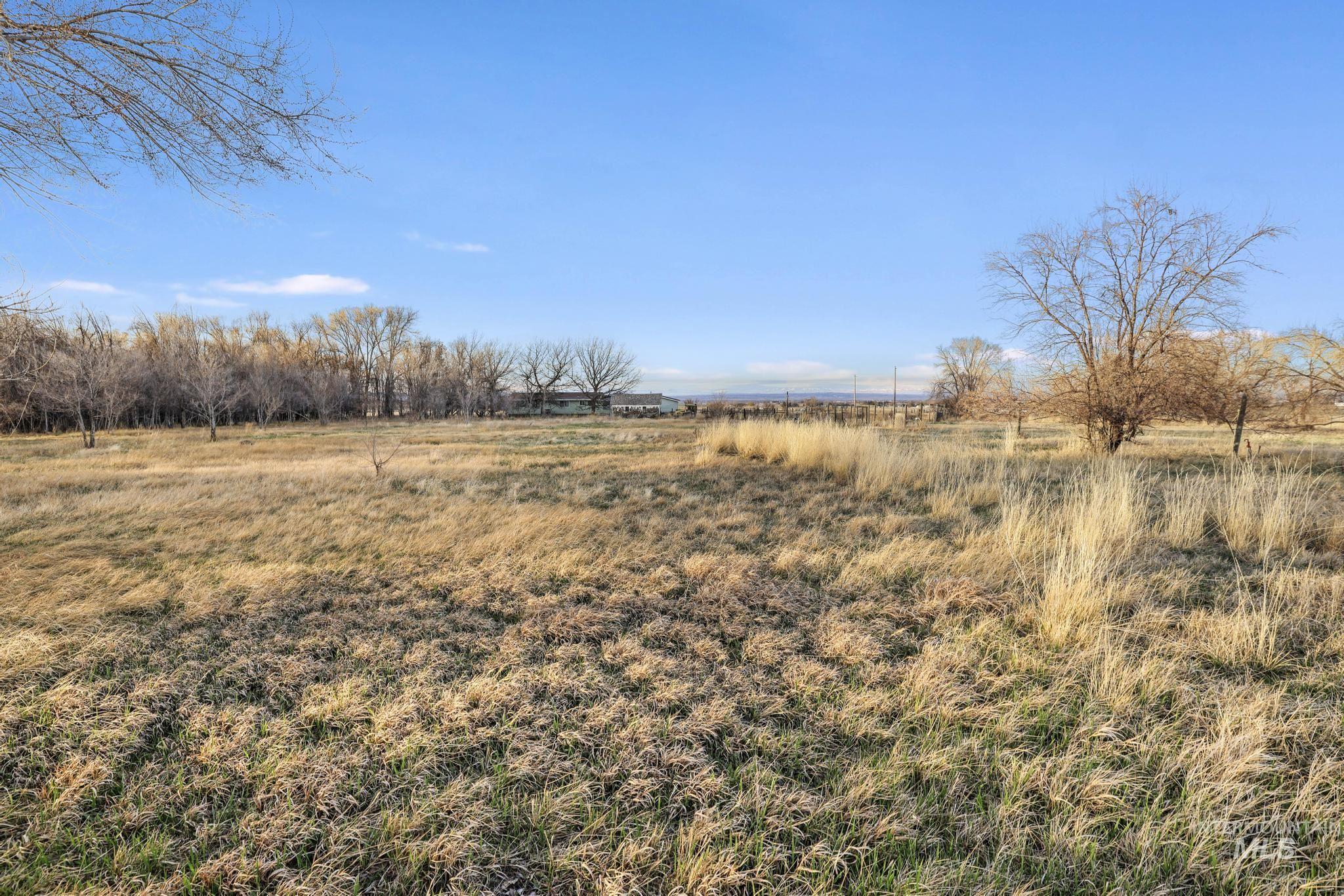 2735 East 3300 N Road Twin Falls, ID 83301 - Photo 24 of 24 View of yard featuring a view of rural / pastoral area