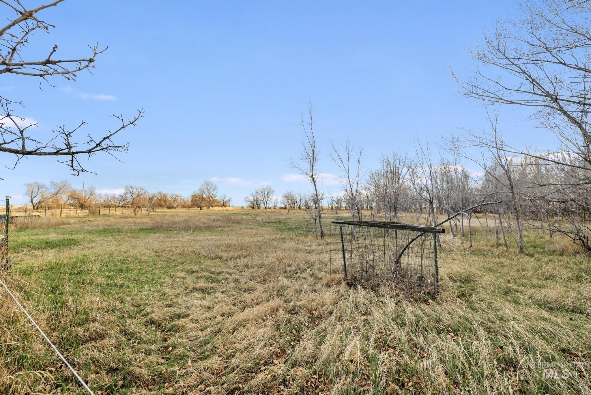 2735 East 3300 N Road Twin Falls, ID 83301 - Photo 5 of 24 View of yard featuring a rural view