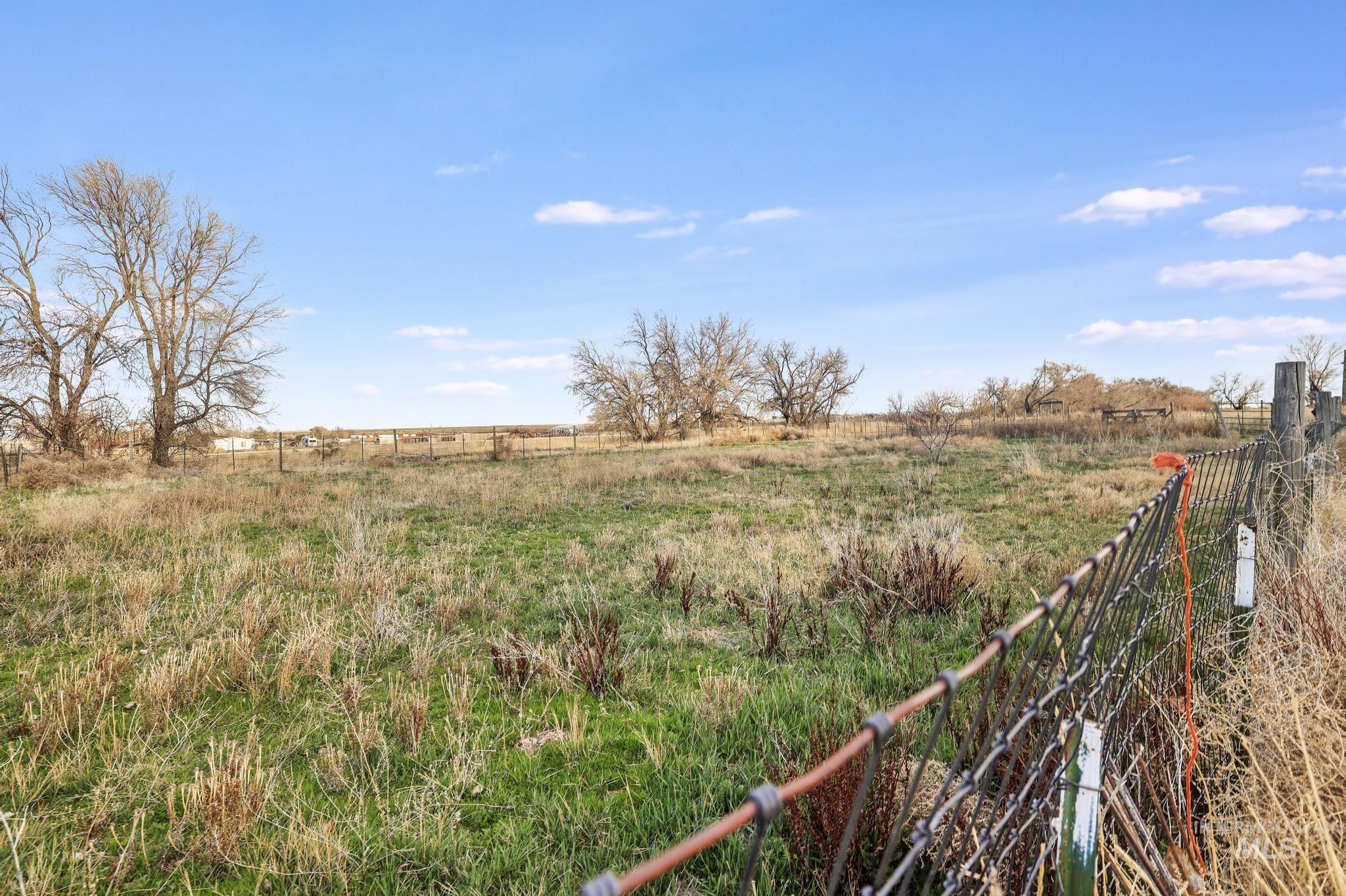 2735 East 3300 N Road Twin Falls, ID 83301 - Photo 10 of 24 View of yard with a rural view