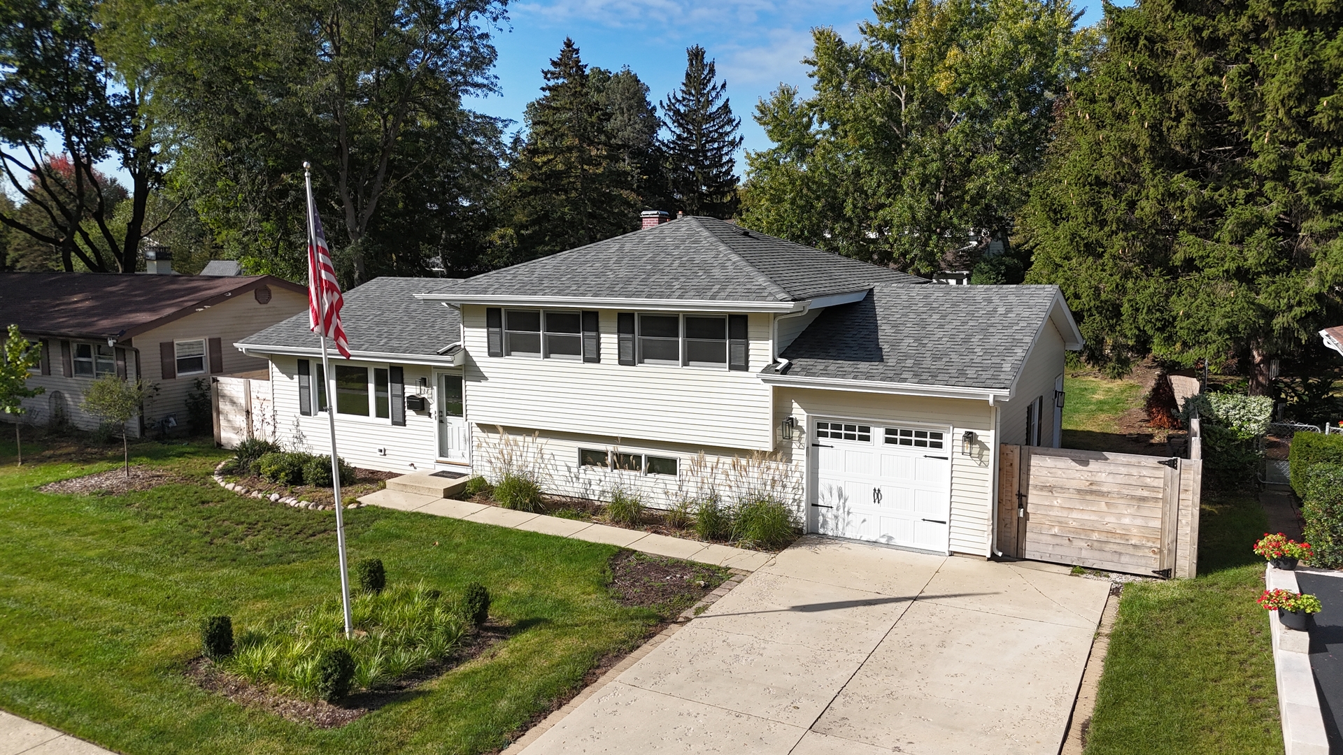 208 South River Road Fox River Grove, IL 60021 - Photo 23 of 40 a front view of a house with a yard