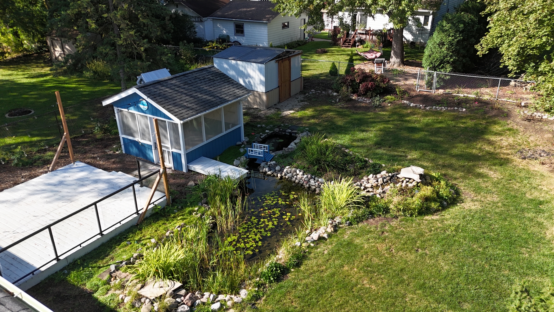 208 South River Road Fox River Grove, IL 60021 - Photo 27 of 40 a backyard of a house with table and chairs