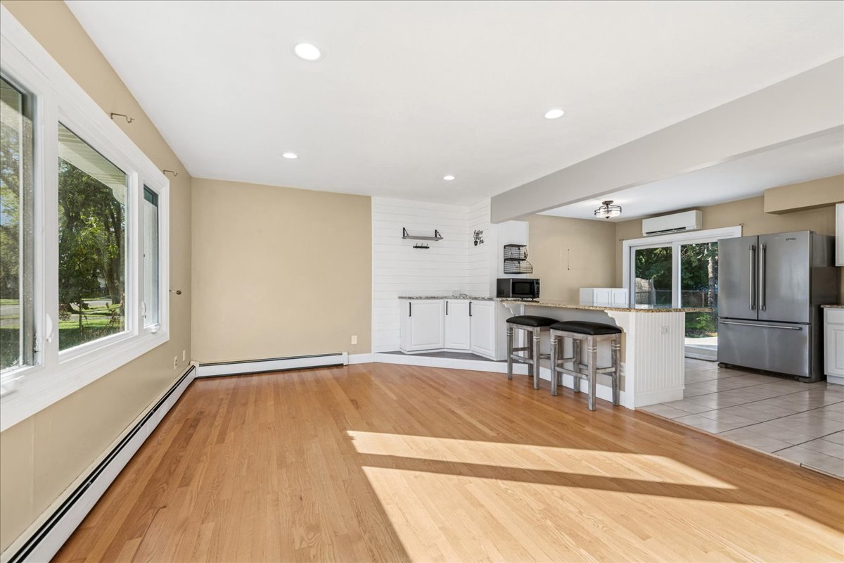 208 South River Road Fox River Grove, IL 60021 - Photo 3 of 40 a view of a kitchen with furniture and a rug