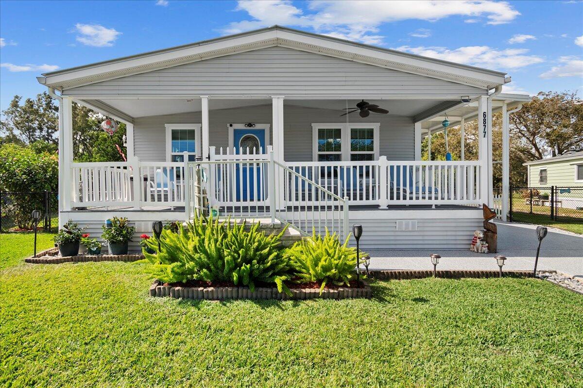 6877 Southeast Delegate Street Hobe Sound, FL 33455 - Photo 2 of 33 02-JLC_2006