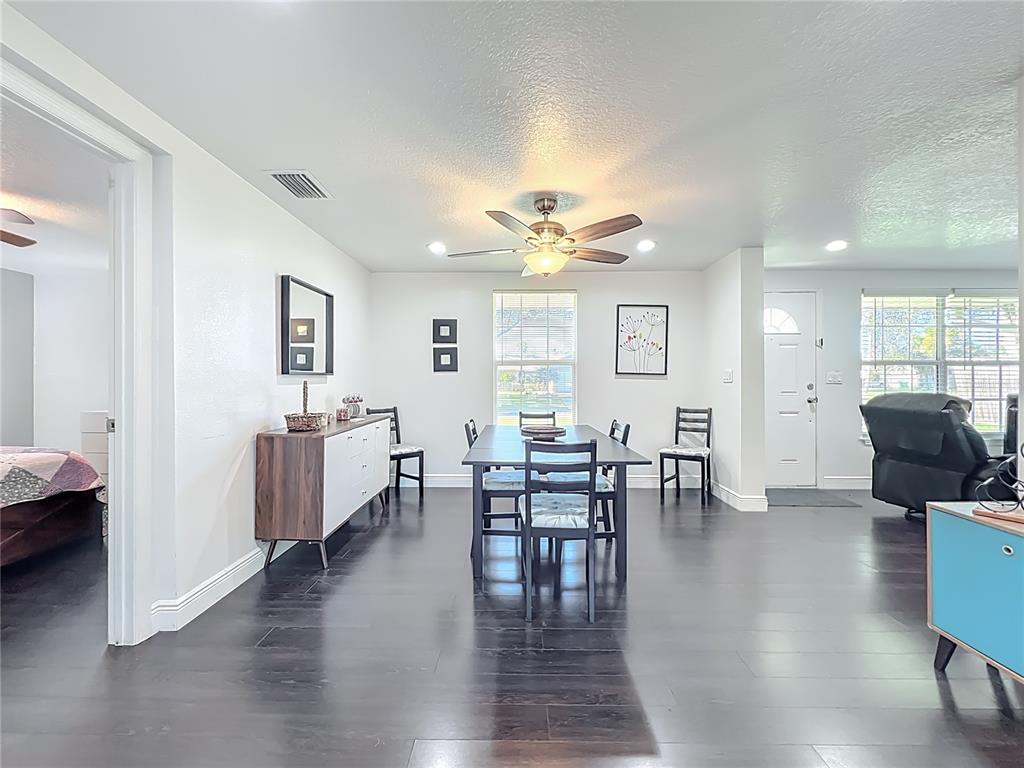 4760 Ivan Street Cocoa, FL 32927 - Photo 11 of 53 a view of a livingroom with furniture and hardwood floor