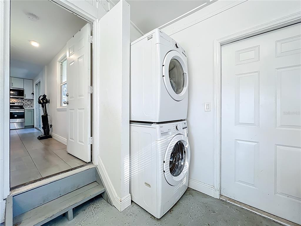 4760 Ivan Street Cocoa, FL 32927 - Photo 40 of 53 a utility room with dryer and washer
