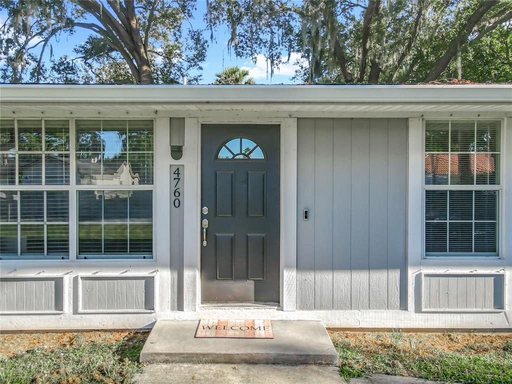 4760 Ivan Street Cocoa, FL 32927 - Photo 4 of 53 a view of entrance gate of the house