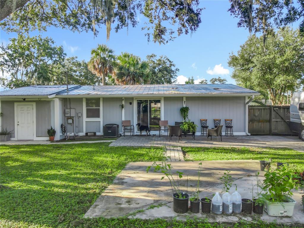 4760 Ivan Street Cocoa, FL 32927 - Photo 45 of 53 a view of a house with a swimming pool