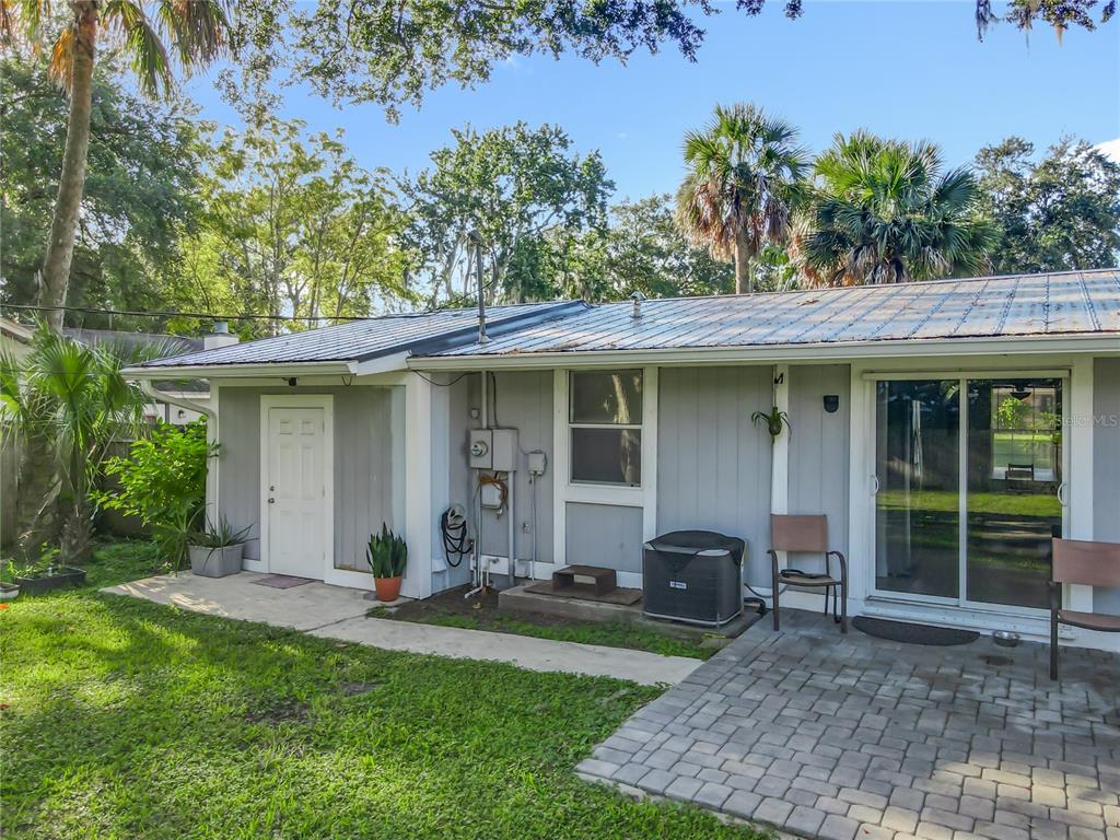 4760 Ivan Street Cocoa, FL 32927 - Photo 46 of 53 a front view of a house with garden