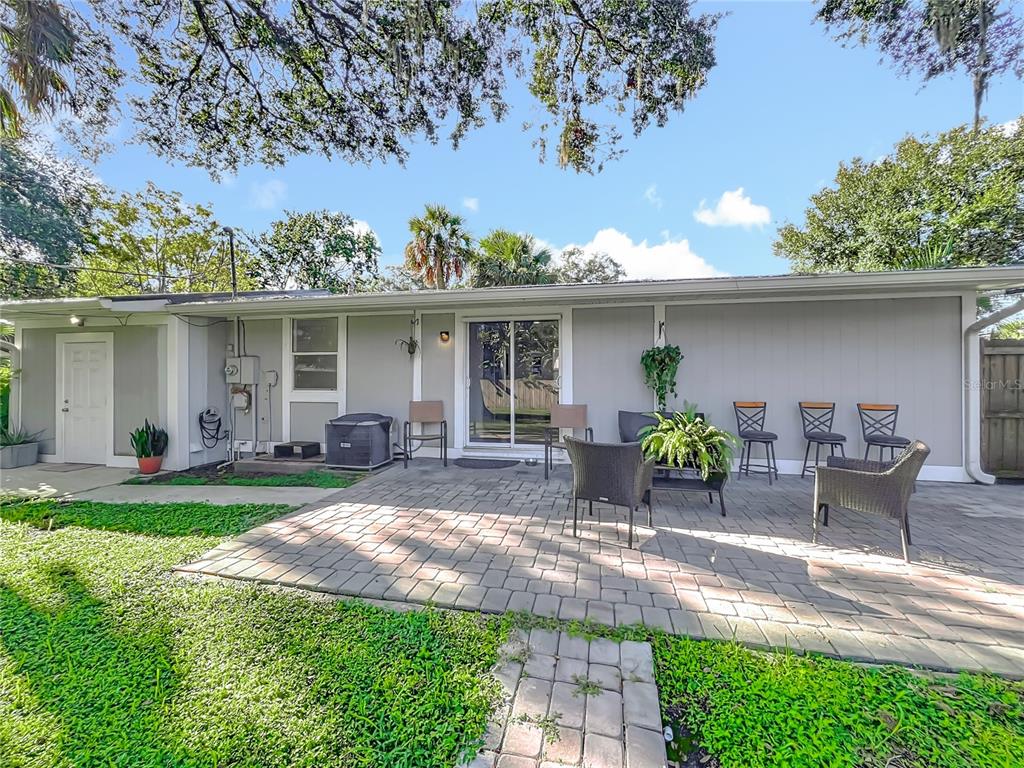 4760 Ivan Street Cocoa, FL 32927 - Photo 52 of 53 a front view of house with yard and seating space
