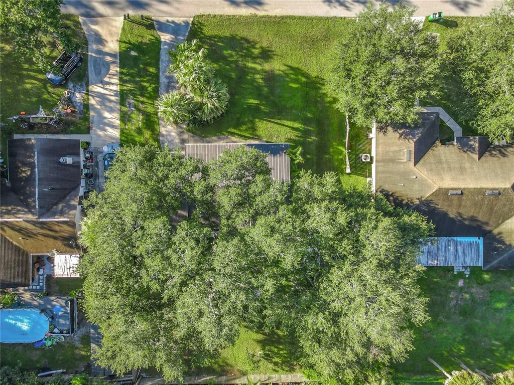 4760 Ivan Street Cocoa, FL 32927 - Photo 53 of 53 an aerial view of a house with a yard