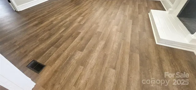 a view of a house with a door and a window