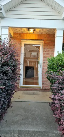 a view of front door of house with garage