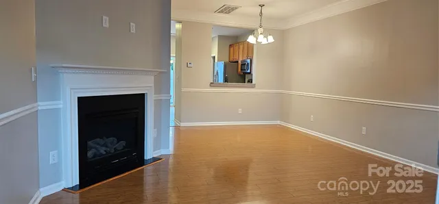 a view of a room with an empty space